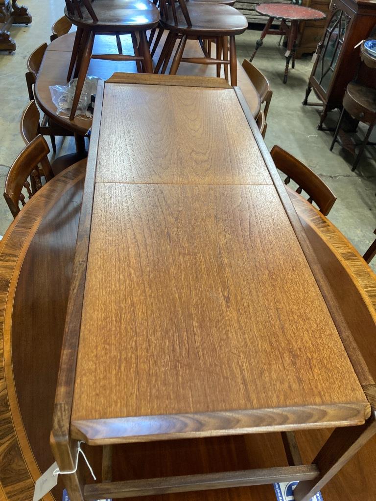 A Rempley teak sliding top coffee table, circa 1970